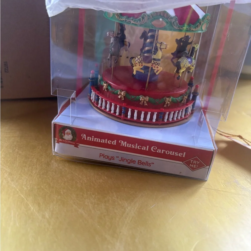 Animated Musical Carousel with Red and Green Accents - Picture 2 of 7